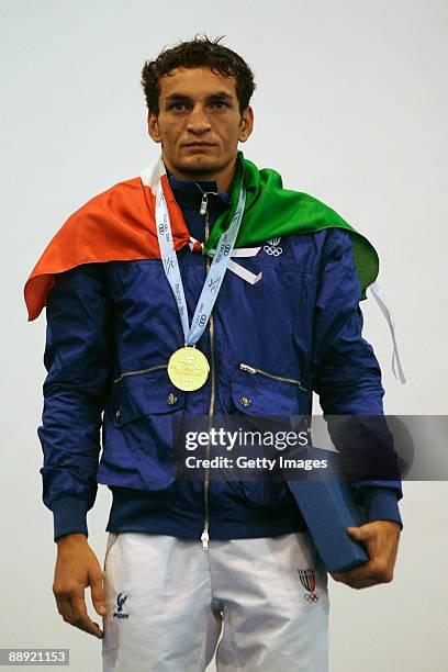 Gold medalist Vittorio Parrinello of Italy stands on the podium during the medal ceremony Men's Bantam 54kg final on day 6 during the XVI...
