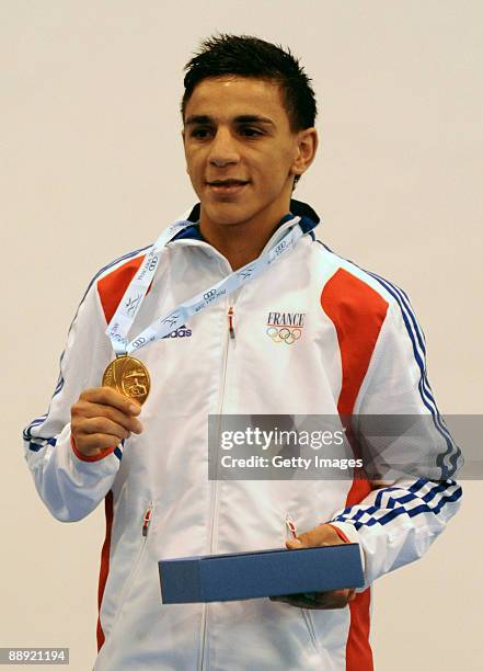 Gold medalist Nordine Oubaali of France stands on the podium during the medal ceremony Men's Fly 51kg final on day 6 during the XVI Mediterranean...