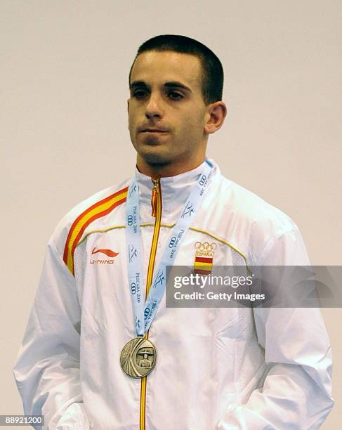 Silver medalist Francisco Torrijos Portillo of Spain stands on the podium during the medal ceremony Men's Fly 51kg final on day 6 during the XVI...