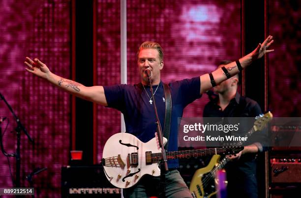 Josh Homme of Queens of the Stone Age performs onstage during KROQ Almost Acoustic Christmas 2017 at The Forum on December 9, 2017 in Inglewood,...