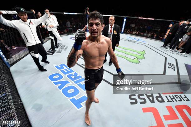 Gabriel Benitez of Mexico raises his hands after facing Jason Knight in their featherweight bout during the UFC Fight Night event inside Save Mart...