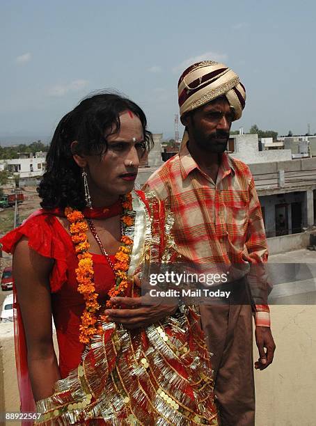 Sapna and Jarnail Singh, who could possibly be one of the few married gay couples in India, pose together after their marriage at the ancient Mansa...