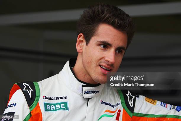 Adrian Sutil of Germany and Force India is seen in the paddock during previews to the German Formula One Grand Prix at Nurburgring on July 9, 2009 in...