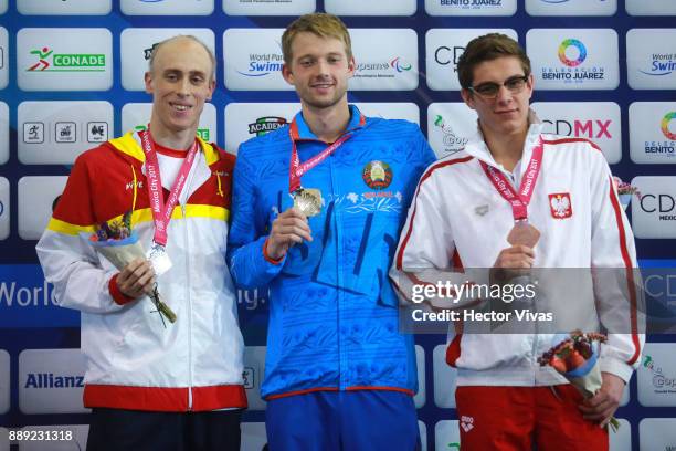 Boki Ihar of Belarus, Gold Medal, Salguero Oteiza of Spain Silver Medal and Kamil Rzetelski Bronze Medal pose after the men's 100 m Freestyle S13...