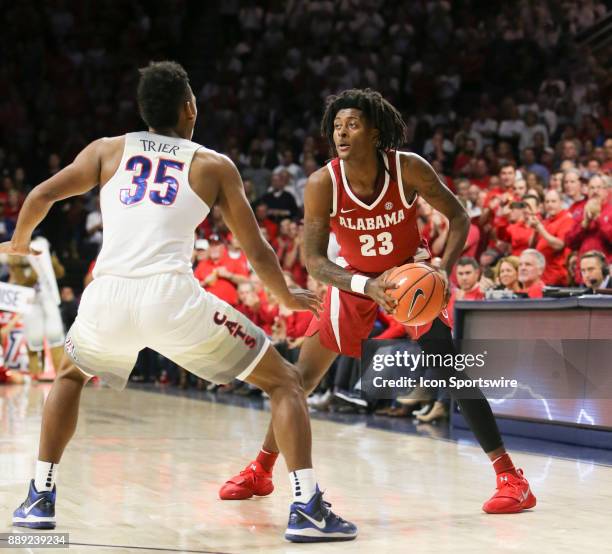 Alabama Crimson Tide guard John Petty hold the ball during a college basketball game between Alabama Crimson Tide and Arizona Wildcats on December 09...