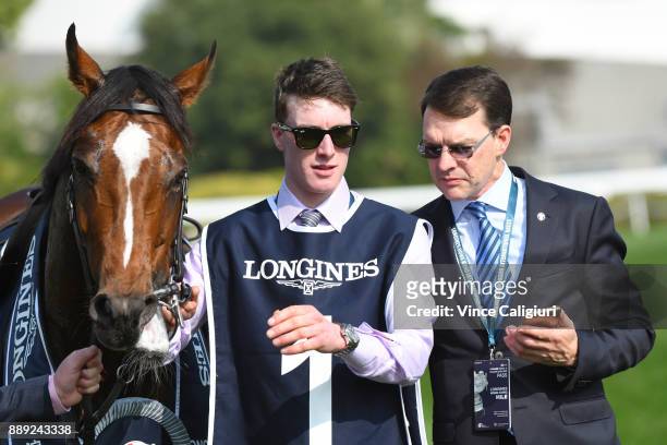 Trainer Aidan O'Brien poses with Highland Reel after winning Race 4, The Longines Hong Kong Vase during Longines Hong Kong International Race Day at...