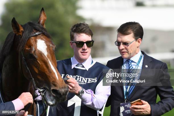 Trainer Aidan O'Brien poses with Highland Reel after winning Race 4, The Longines Hong Kong Vase during Longines Hong Kong International Race Day at...