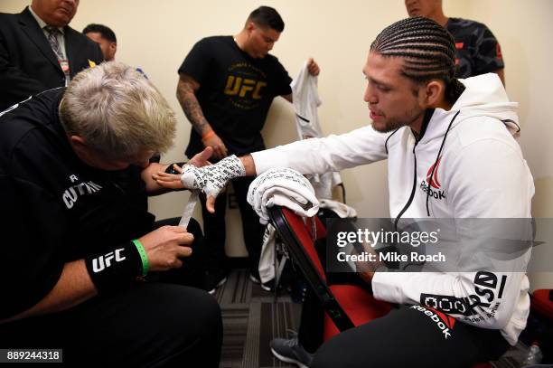 Brian Ortega gets his hands wrapped backstage during the UFC Fight Night event inside Save Mart Center on December 9, 2017 in Fresno, California.