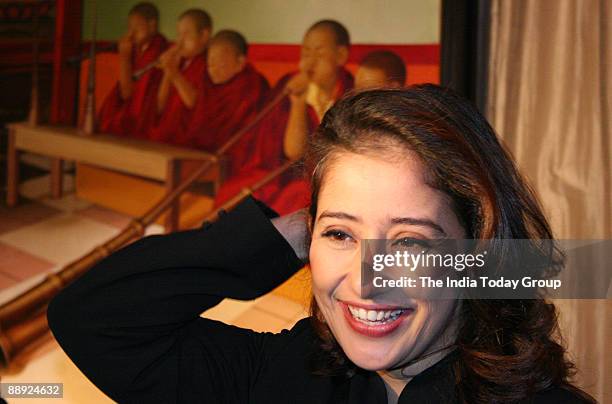 Bollywood actress Manisha Koirala at artist Raghu Vyas' painting exhibition at The Oberoi, New Delhi.