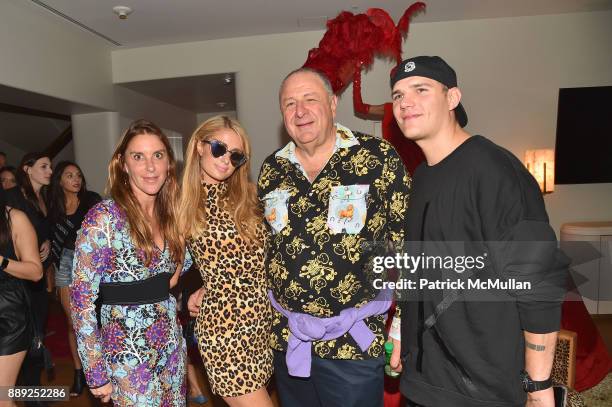 Dori Cooperman, Paris Hilton, Jean Pigozzi, Chris Zylka attend the Galerie Gmurzynska Dinner in Honor of Jean Pigozzi at the Penthouse at the Faena...