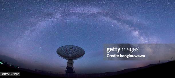 galaxy and radio telescope - satellite imagens e fotografias de stock