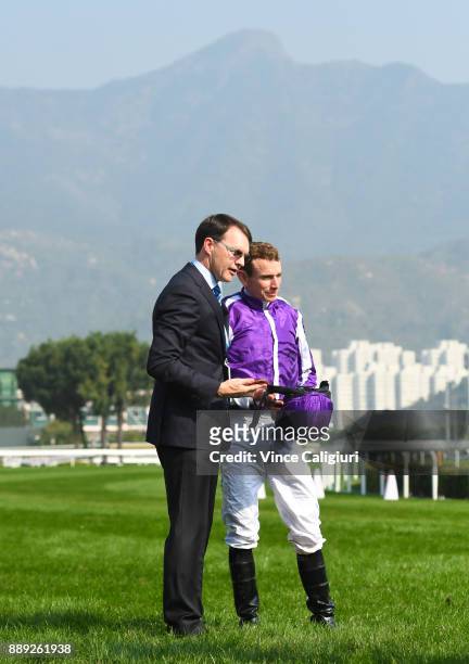 Trainer Aidan O'Brien poses with Ryan Moore after Highland Reel won Race 4, The Longines Hong Kong Vase during Longines Hong Kong International Race...