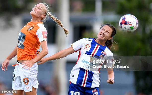 Tameka Butt of the Roar and Clare Wheeler of the Jets compete for the ball during the round seven W-League match between the Brisbane Roar and the...