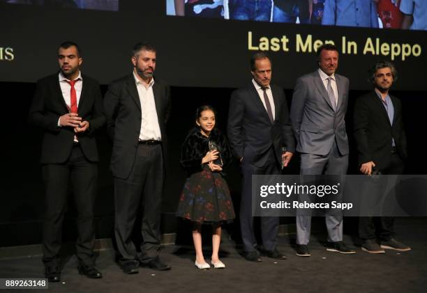 Hamoud Al-Mousa, Evgeny Afineevsky, Bana al-Abed, Sebastian Junger, Nick Quested and Firas Fayyad at the 33rd Annual IDA Documentary Awards at...