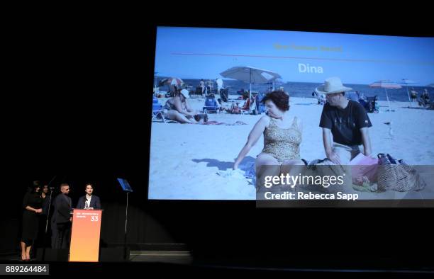 Dan Sickles and Antonio Santini pose with the Best Feature Award at the 33rd Annual IDA Documentary Awards at Paramount Theatre on December 9, 2017...