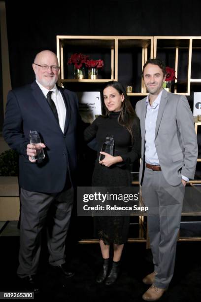 Thomas Lee Wright , Laura Checkoway, and Tim Horsburgh pose with the Best Short award at the 33rd Annual IDA Documentary Awards at Paramount Theatre...