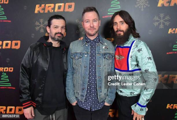 Tomo Milicevic, KROQ DJ Stryker and Jared Leto of Thirty Seconds to Mars pose in the press room during KROQ Almost Acoustic Christmas 2017 at The...
