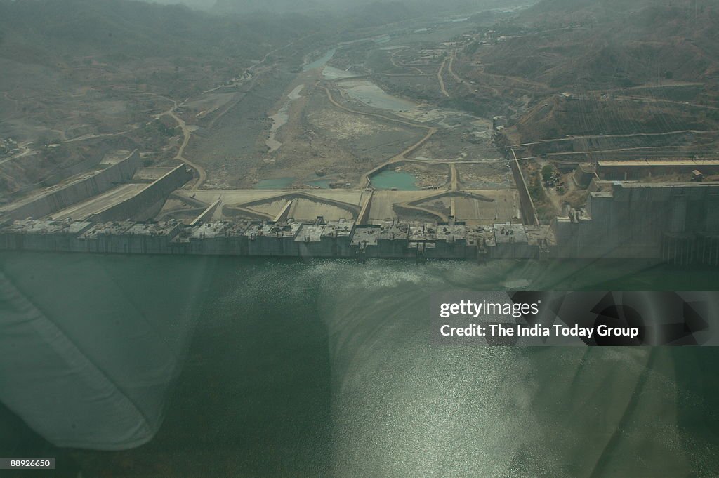 Aerial View of the site of Sardar Sarovar Dam Yojana at Kevadia colony in Gujarat, India ( Narmada Dam )