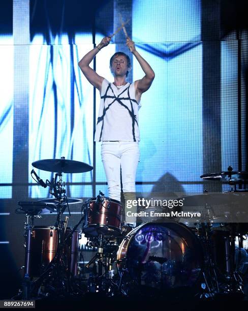 Dominic Howard of Muse performs onstage during KROQ Almost Acoustic Christmas 2017 at The Forum on December 9, 2017 in Inglewood, California.