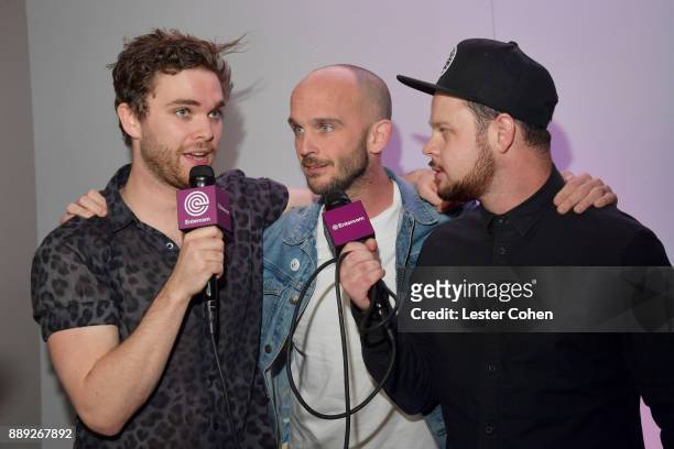 Mike Kerr and Ben Thatcher of Royal Blood pose in the press room with Zach Blair of Rise Against attend KROQ Almost Acoustic Christmas 2017 at The...