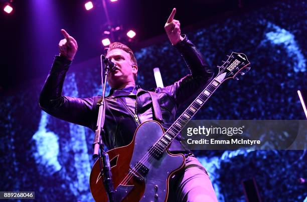Josh Homme of Queens of the Stone Age performs onstage during KROQ Almost Acoustic Christmas 2017 at The Forum on December 9, 2017 in Inglewood,...