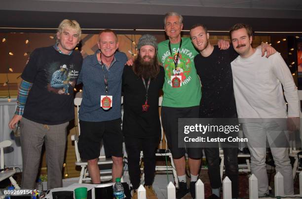 DJs Kevin Ryder, Gene 'Bean' Baxter pose backstage with Judah & The Lion during KROQ Almost Acoustic Christmas 2017 at The Forum on December 9, 2017...