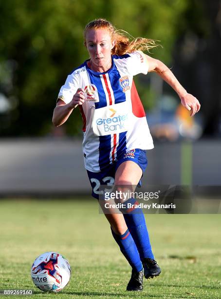 Victoria Huster of the Jets breaks away from the defence during the round seven W-League match between the Brisbane Roar and the Newcastle jets at AJ...