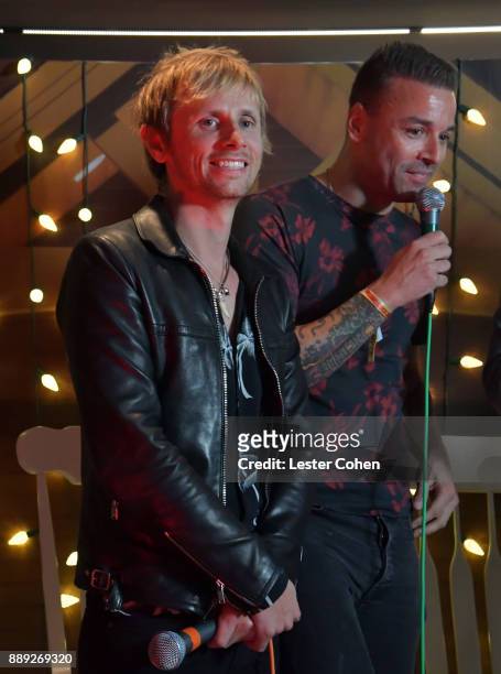 Dominic Howard and Chris Wolstenholme of Muse performs onstage during KROQ Almost Acoustic Christmas 2017 at The Forum on December 9, 2017 in...