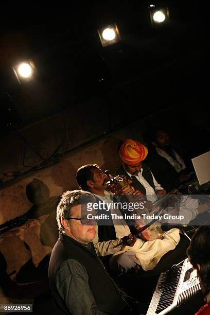 Tom Bailey of the UK band, The Thompson Twins, shares the stage with Rajasthani artists at Holiwater, an audio-visual fusion gig at Nahargarh fort's...