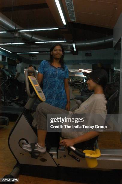 Ashwini, The Dietician of Blue Boutique Gym with her client at the Gymnasium in Chennai, Tamil Nadu, India