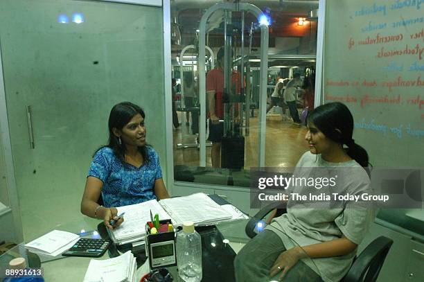 Ashwini, The Dietician of Blue Boutique Gym with her client at the Gymnasium in Chennai, Tamil Nadu, India