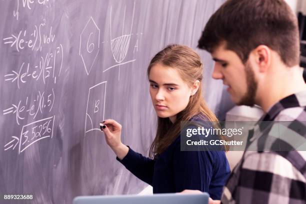 practicing advanced calculus to better improve the grade - calculus class stock pictures, royalty-free photos & images