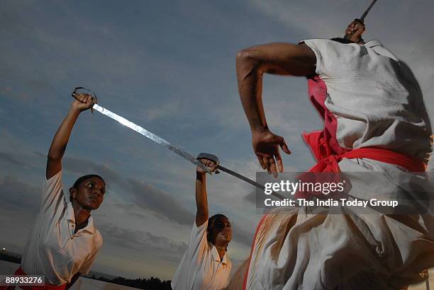 Women practicing Kalaripayattu in Trivandrum, Kerala, India