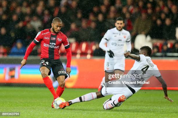 Marcus Coco of Guingamp and Papy Djilobodji of Dijon during the Ligue 1 match between EA Guingamp and Dijon FCO at Stade du Roudourou on December 9,...