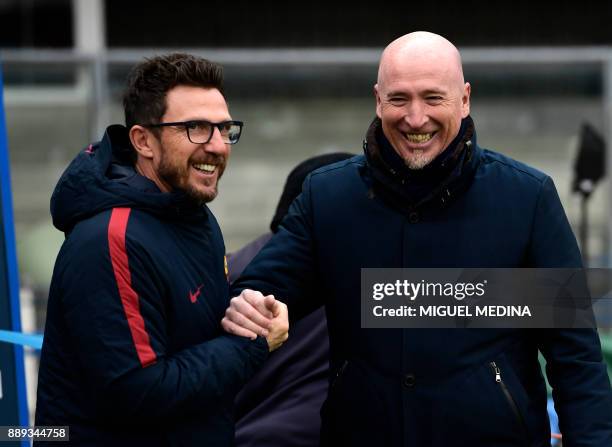 Roma's Italian coach Eusebio Di Francesco and Chievo's Italian coach Rolando Maran speaks prior to the Italian Serie A football match between AC...