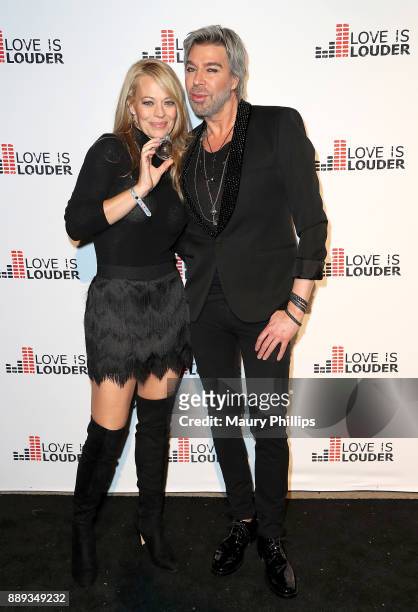 Jeri Ryan and Chaz Dean arrives at Chaz Dean Winter Party 2017 benefiting Love is Louder on December 9, 2017 in Los Angeles, California.