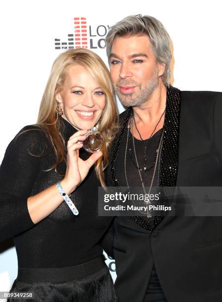 Jeri Ryan and Chaz Dean arrives at Chaz Dean Winter Party 2017 benefiting Love is Louder on December 9, 2017 in Los Angeles, California.