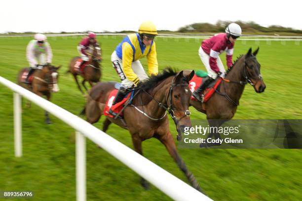 Ireland - 10 December 2017; Runners and riders start the first race including, from left, Low Sun with Paul Townend up, Roaring Bull with Davy...