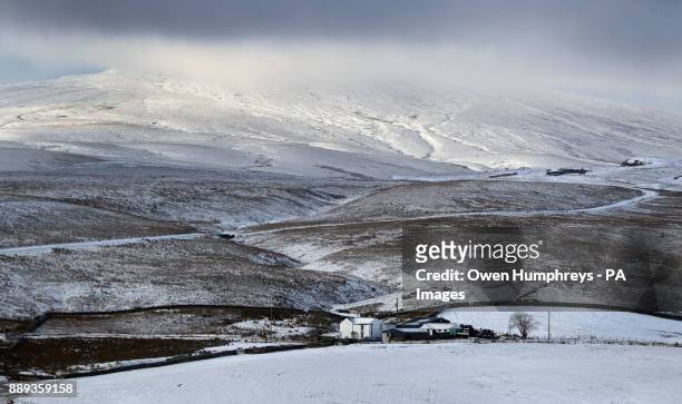 Farmhouse Middleton in Teesdale, Durham, as heavy snowfall across parts of the UK is causing widespread disruption, closing roads and grounding...