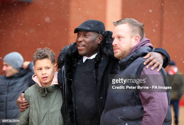 Former Everton forward Kevin Campbell poses with fans prior to the Premier League match at Anfield, Liverpool.