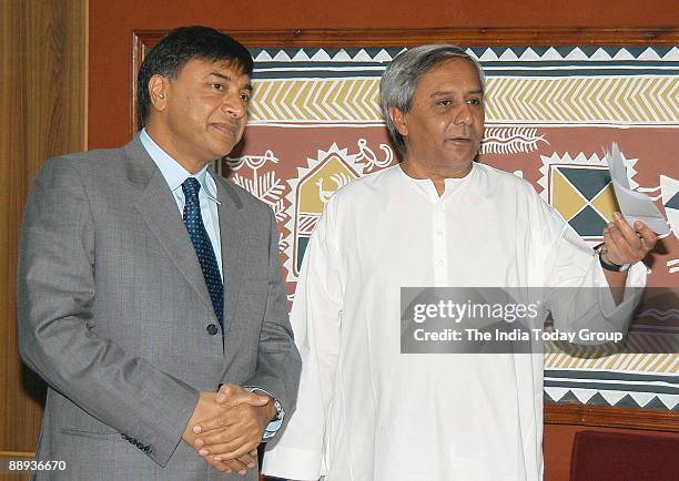 Naveen Patnaik, Chief Minister of Orissa with Lakshmi Nivas Mittal , London-based Indian billionaire industrialist