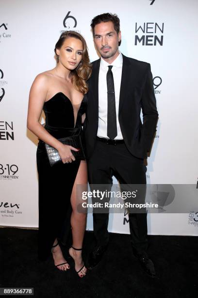 Sheldon Souray and guest arrive to Chaz Dean winter party 2017 benefiting Love is Louder on December 9, 2017 in Los Angeles, California.