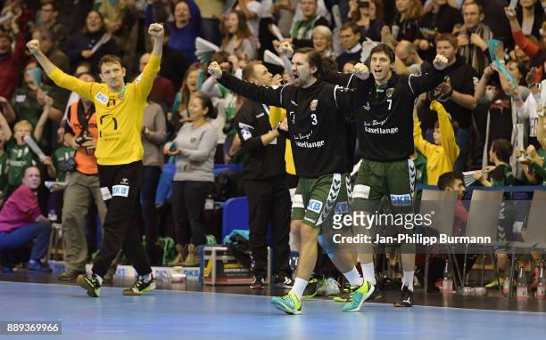 Petr Stochl, Fabian Wiede and Kevin Struck of Fuechse Berlin after the game between Fuechse Berlin and dem MT Melsungen on december 10, 2017 in...