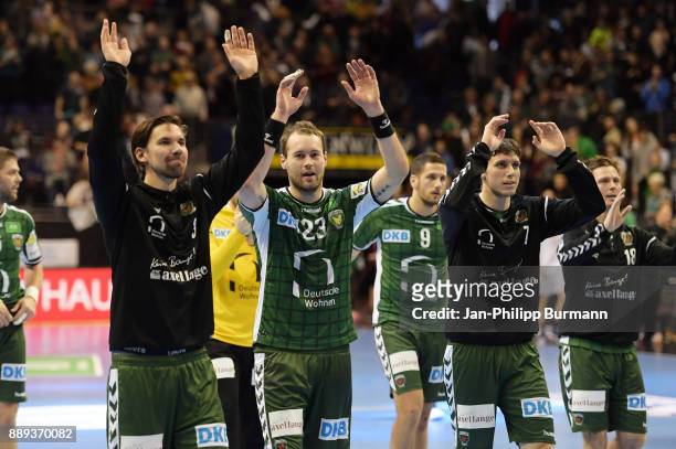 Fabian Wiede, Steffen Faeth and Kevin Struck of Fuechse Berlin after the game between Fuechse Berlin and dem MT Melsungen on december 10, 2017 in...