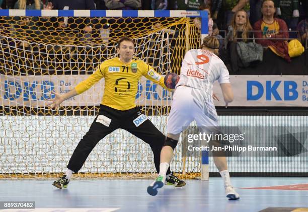 Petr Stochl of Fuechse Berlin and Tobias Reichmann of MT Melsungen during the game between Fuechse Berlin and dem MT Melsungen on december 10, 2017...