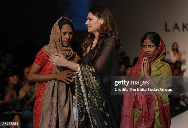 Fashion designer Agnimitra Paul along with Models are walking on the ramp with her outfit at Lakme Fashion Week Spring Summer-2007 in Mumbai,...