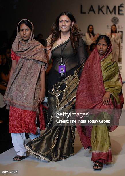 Fashion designer Agnimitra Paul along with Models are walking on the ramp with her outfit at Lakme Fashion Week Spring Summer-2007 in Mumbai,...