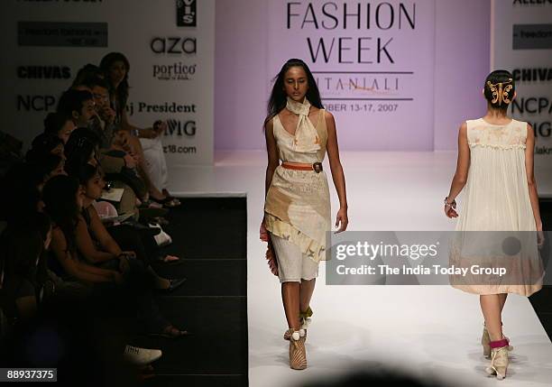 Models are walking on the ramp with Fashion designer Agnimitra Paul outfit at Lakme Fashion Week Spring Summer-2007 in Mumbai, Maharashtra, India