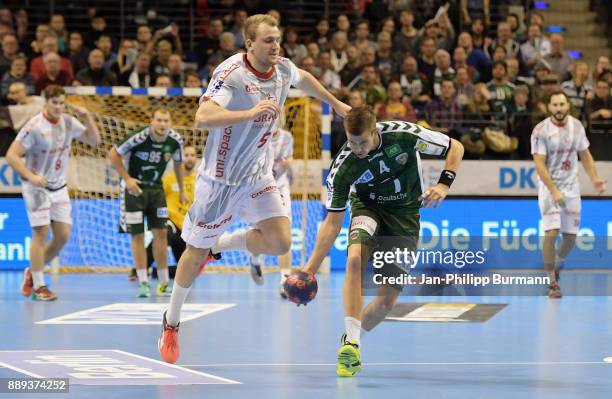 Julius Kuehn of MT Melsungen and Bjarki Mar Elisson of Fuechse Berlin during the game between Fuechse Berlin and dem MT Melsungen on december 10,...