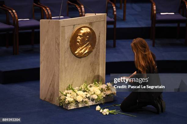 Woman is doing floral arrangement on stage prior the Nobel Prize Awards Ceremony at Concert Hall on December 10, 2017 in Stockholm, Sweden.